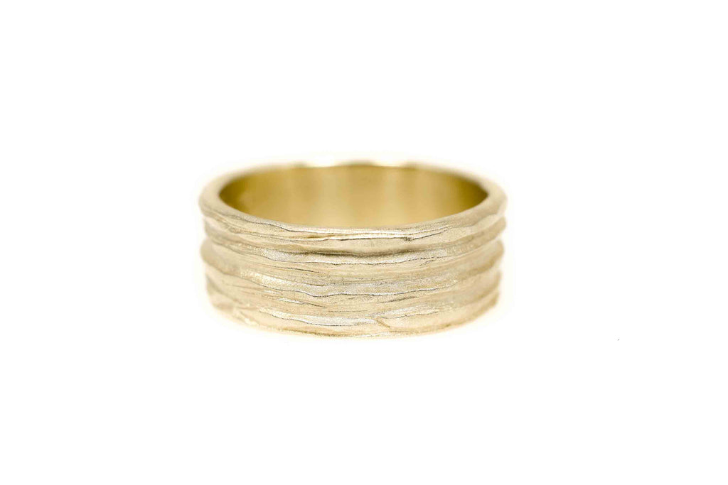 celebration rings  Symbiosis hammered ring  yellow gold - Saagæ wedding rings & engagement rings by Liesbeth Busman